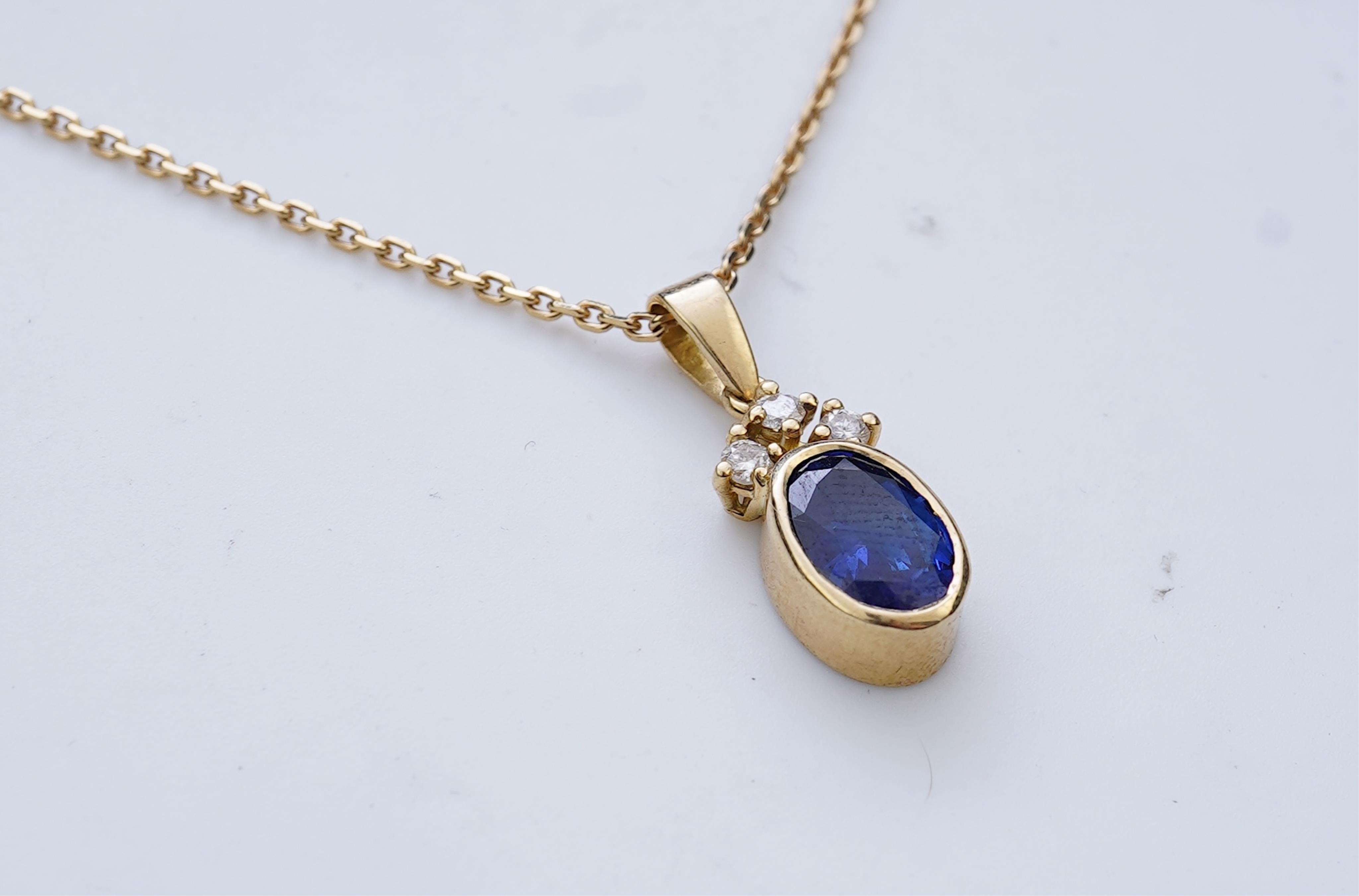 A sapphire and diamond pendant